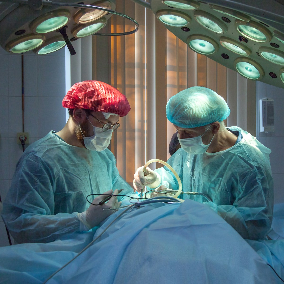 Professional surgeons performing precision surgery